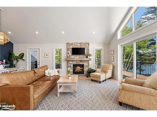 4318 Glamorgan Road, Dysart, ON - Indoor Photo Showing Living Room With Fireplace