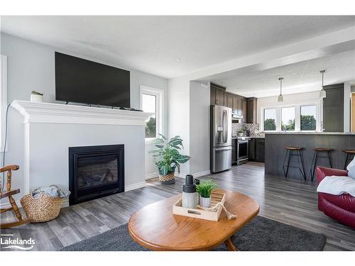 615796 3Rd Line, The Blue Mountains, ON - Indoor Photo Showing Living Room With Fireplace