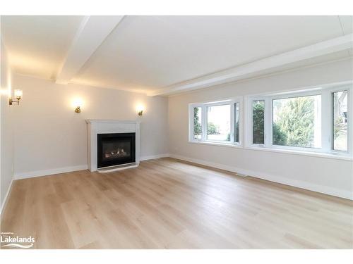 15 Hawthorne Drive, Innisfil, ON - Indoor Photo Showing Living Room With Fireplace