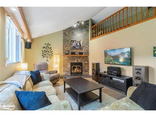 28 Lake Drive, Huntsville, ON - Indoor Photo Showing Living Room With Fireplace