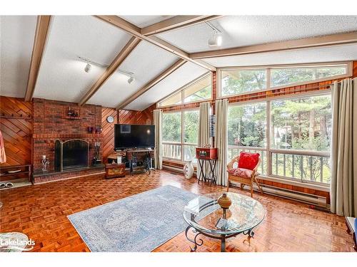 95 42Nd Street S, Wasaga Beach, ON - Indoor Photo Showing Living Room With Fireplace