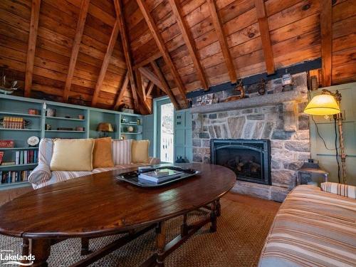 2105 Deer Island, Severn, ON - Indoor Photo Showing Living Room With Fireplace