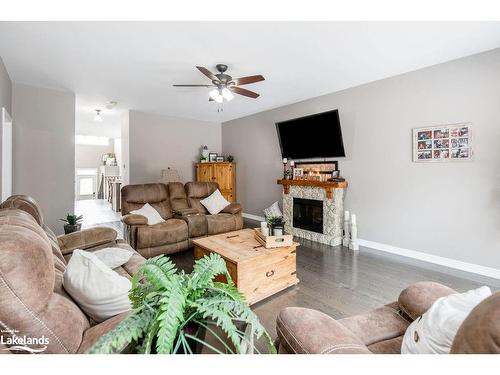 19 Falvo Street, Wasaga Beach, ON - Indoor Photo Showing Living Room With Fireplace