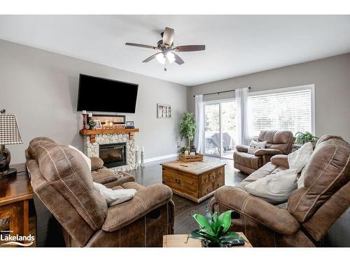 19 Falvo Street, Wasaga Beach, ON - Indoor Photo Showing Living Room With Fireplace