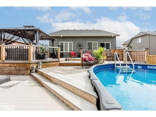 19 Falvo Street, Wasaga Beach, ON - Outdoor With Above Ground Pool With Deck Patio Veranda With Exterior