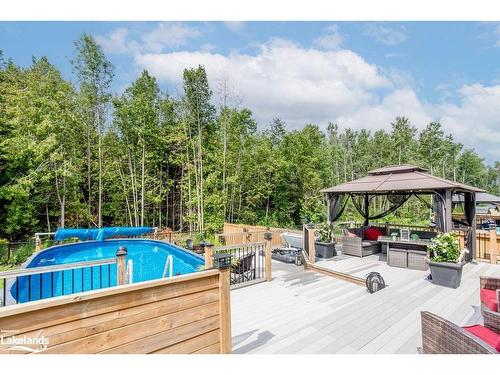 19 Falvo Street, Wasaga Beach, ON - Outdoor With Above Ground Pool With Deck Patio Veranda With Backyard