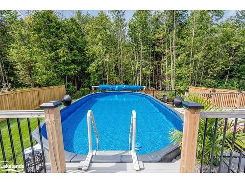 19 Falvo Street, Wasaga Beach, ON - Outdoor With Above Ground Pool With Backyard