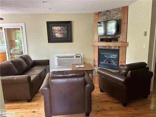 118-3-1052 Rat Bay Road, Lake Of Bays (Twp), ON - Indoor Photo Showing Living Room With Fireplace