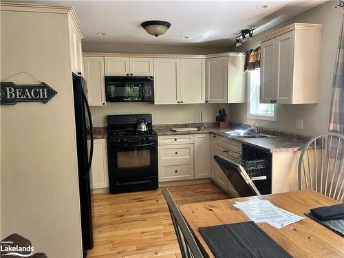 118-3-1052 Rat Bay Road, Lake Of Bays (Twp), ON - Indoor Photo Showing Kitchen With Double Sink