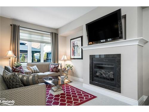 32 Sandy Coast Crescent, Wasaga Beach, ON - Indoor Photo Showing Living Room With Fireplace