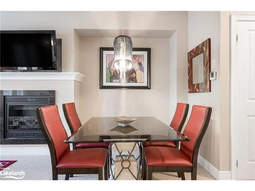 32 Sandy Coast Crescent, Wasaga Beach, ON - Indoor Photo Showing Dining Room With Fireplace