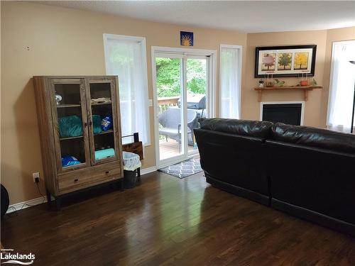 20-1591 Hidden Valley Road, Huntsville, ON - Indoor Photo Showing Living Room With Fireplace