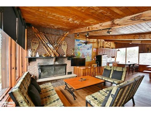 163 Tyrolean Lane, The Blue Mountains, ON - Indoor Photo Showing Living Room With Fireplace