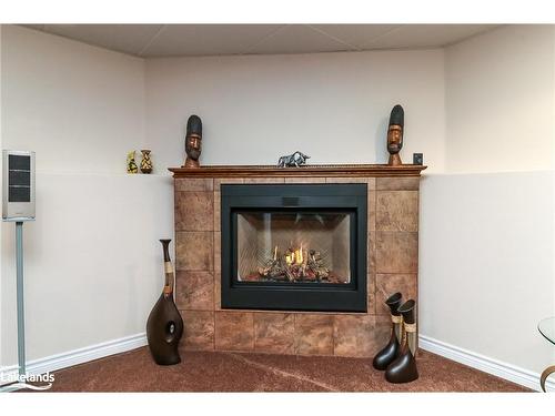 34 Cranberry Heights, Wasaga Beach, ON - Indoor Photo Showing Living Room With Fireplace
