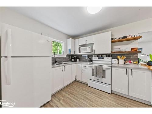 51 Louis Avenue, Tiny Twp, ON - Indoor Photo Showing Kitchen With Double Sink