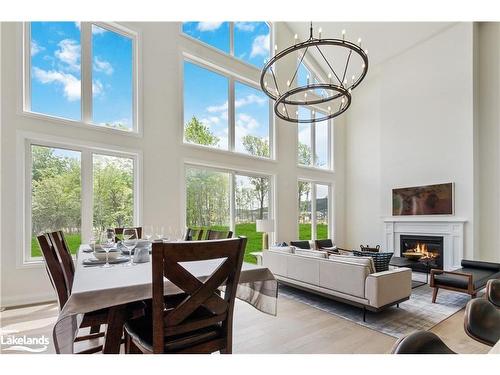 115 Stillwater Crescent, The Blue Mountains, ON - Indoor Photo Showing Dining Room With Fireplace