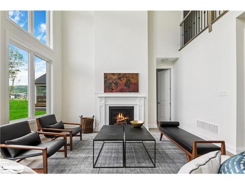 115 Stillwater Crescent, The Blue Mountains, ON - Indoor Photo Showing Living Room With Fireplace