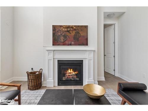 115 Stillwater Crescent, The Blue Mountains, ON - Indoor Photo Showing Living Room With Fireplace