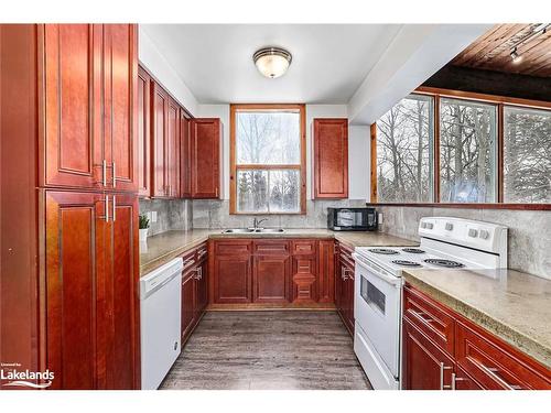 141 Kandahar Lane, The Blue Mountains, ON - Indoor Photo Showing Kitchen With Double Sink