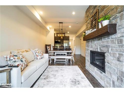 106-16 Beckwith Lane, The Blue Mountains, ON - Indoor Photo Showing Living Room With Fireplace