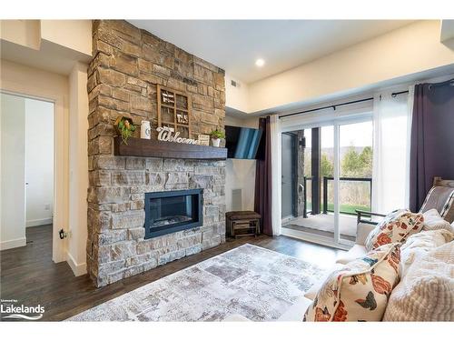 106-16 Beckwith Lane, The Blue Mountains, ON - Indoor Photo Showing Living Room With Fireplace