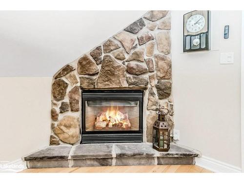 1259 Golf Course Road, Huntsville, ON - Indoor Photo Showing Living Room With Fireplace