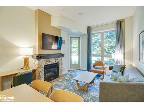 114-170 Jozo Weider Boulevard, The Blue Mountains, ON - Indoor Photo Showing Living Room With Fireplace