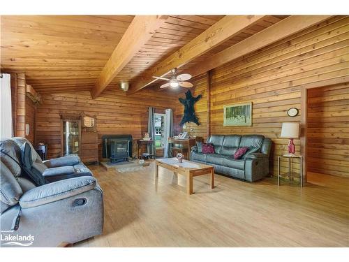 1009 Chippawa Lane, Gravenhurst, ON - Indoor Photo Showing Living Room With Fireplace