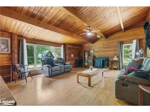 1009 Chippawa Lane, Gravenhurst, ON - Indoor Photo Showing Living Room With Fireplace