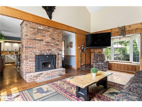 269 Old Muskoka Rd S, South River, ON - Indoor Photo Showing Living Room With Fireplace