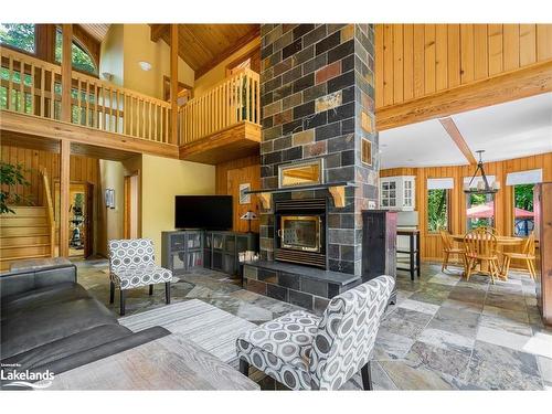 61 Lackie Crescent, Tiny, ON - Indoor Photo Showing Living Room With Fireplace