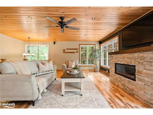 1201 Tingey Road N, Bracebridge, ON - Indoor Photo Showing Living Room With Fireplace