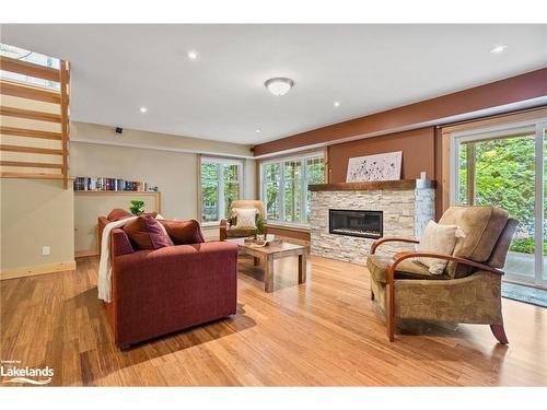 1201 Tingey Road N, Bracebridge, ON - Indoor Photo Showing Living Room With Fireplace