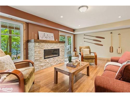 1201 Tingey Road N, Bracebridge, ON - Indoor Photo Showing Living Room With Fireplace