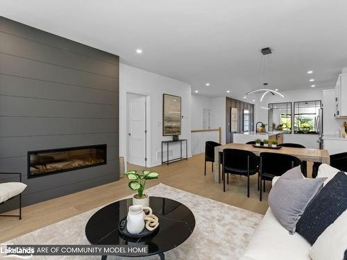 2 Black Spruce Street, Huntsville, ON - Indoor Photo Showing Living Room With Fireplace