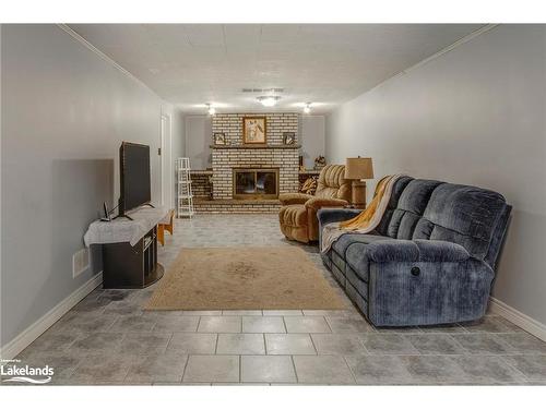 165 Lafontaine Road E, Tiny, ON - Indoor Photo Showing Living Room With Fireplace