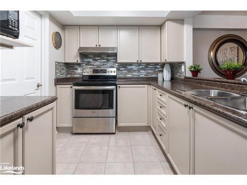 A405-216 Plains Road W, Burlington, ON - Indoor Photo Showing Kitchen With Double Sink