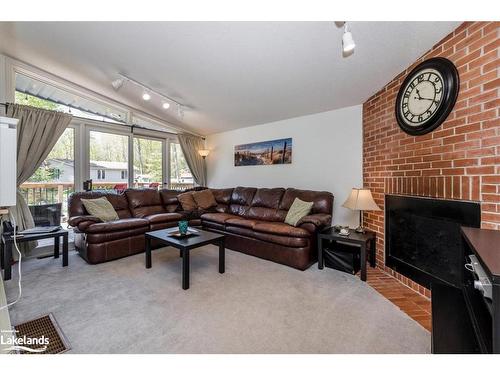 9 Rue Camille Rue, Tiny Twp, ON - Indoor Photo Showing Living Room With Fireplace