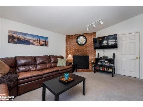 9 Rue Camille Rue, Tiny Twp, ON - Indoor Photo Showing Living Room With Fireplace