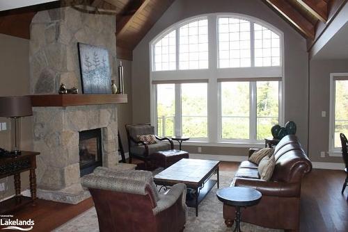 Belmont - W3-3876 Muskoka 118 Road, Port Carling, ON - Indoor Photo Showing Living Room With Fireplace