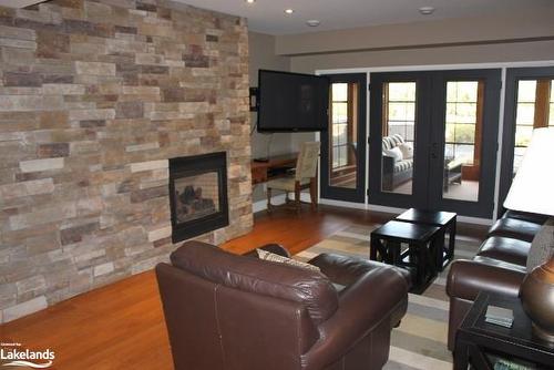 Belmont - W3-3876 Muskoka 118 Road, Port Carling, ON - Indoor Photo Showing Living Room With Fireplace