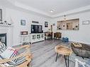 208-130 Steamship Bay Road, Gravenhurst, ON  - Indoor Photo Showing Living Room With Fireplace 