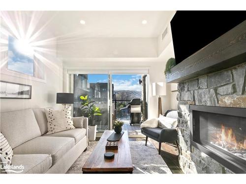 302-12 Beckwith Lane, The Blue Mountains, ON - Indoor Photo Showing Living Room With Fireplace