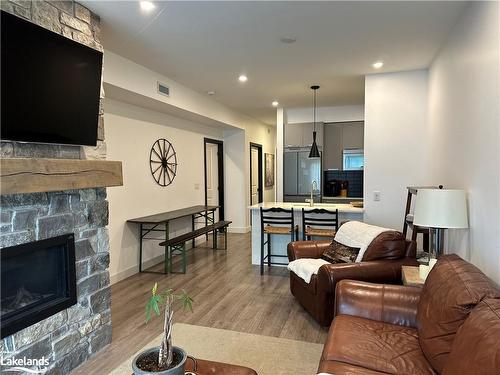 106-12 Beckwith Lane, The Blue Mountains, ON - Indoor Photo Showing Living Room With Fireplace