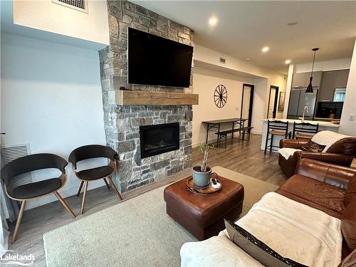 106-12 Beckwith Lane, The Blue Mountains, ON - Indoor Photo Showing Living Room With Fireplace