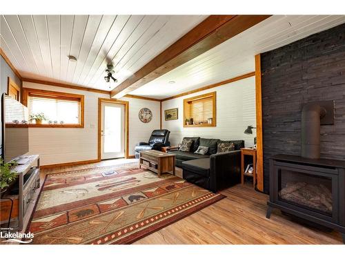 1010 Mary Roberts Road, Baysville, ON - Indoor With Fireplace