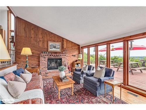 795310 The Blue Mountains - Clearview Townline, The Blue Mountains, ON - Indoor Photo Showing Living Room With Fireplace