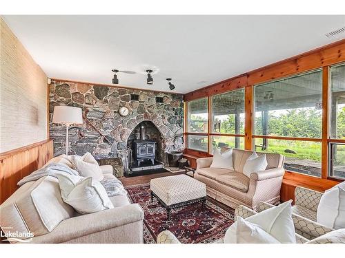 795310 The Blue Mountains - Clearview Townline, The Blue Mountains, ON - Indoor Photo Showing Living Room With Fireplace