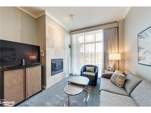 164-220 Gord Canning Drive, The Blue Mountains, ON - Indoor Photo Showing Living Room With Fireplace