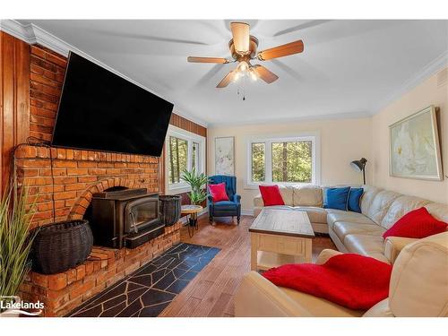 1006 Spring Lake Road, Dwight, ON - Indoor Photo Showing Living Room With Fireplace